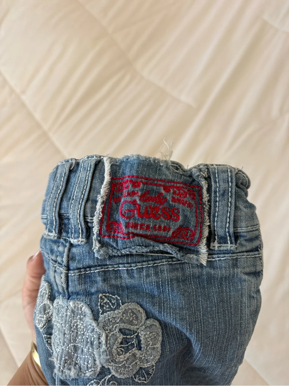 Vintage Guess Blue Denim Jeans with Cream Tie and Red Waist Accents